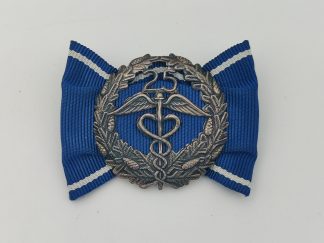 Keskuskauppakamarin ansiomerkki, 25 vuotta, hopeaa